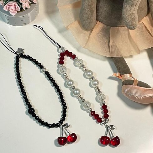 حزام حبل رائع للهاتف على شكل فراشة الكرز للحقائب، حزام معصم ديكور لطيف وأنيق لأجهزة Airpods والكاميرات وحافظة الهاتف in Kuwait