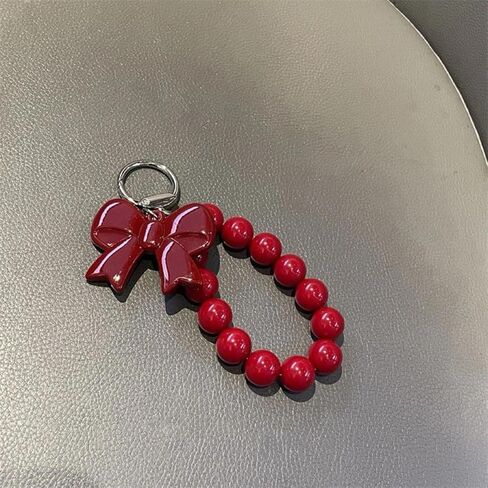 1pc Red Bow Beaded Hand Chain Wrist Short Lanyard Mobile Phone Case Car Key Chain Bag Pendant in Saudi Arabia