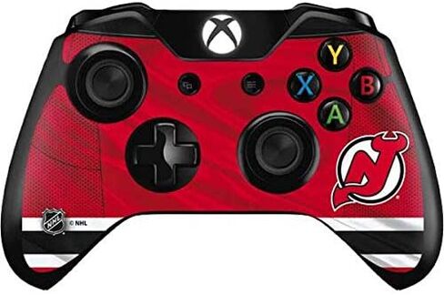 ملصق Skinit المخصص للألعاب متوافق مع وحدة تحكم Xbox One - تصميم جيرسي منزلي مرخص رسميًا من NHL New Jersey Devils in Saudi Arabia