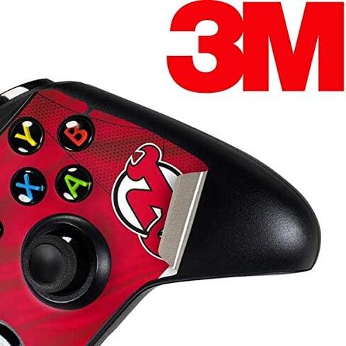 ملصق Skinit المخصص للألعاب متوافق مع وحدة تحكم Xbox One - تصميم جيرسي منزلي مرخص رسميًا من NHL New Jersey Devils in Saudi Arabia