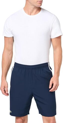 شورت Lacoste الرجالي من قماش التفتا ديامانتي ذو المقاس الكلاسيكي والملون in Saudi Arabia