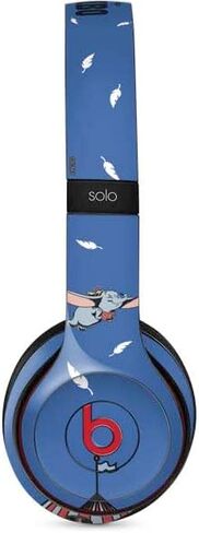 غلاف صوتي من Skinit متوافق مع Beats Solo 2 Wireless - تصميم الفيل الطائر الكلاسيكي من Disney Dumbo المرخص رسميًا in Saudi Arabia