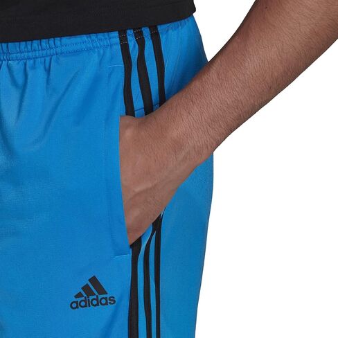 شورت رجالي من adidas مقاس Essentials Warm-up Tricot Regular 3-Stripes، أحمر داكن، كبير/طويل in Kuwait