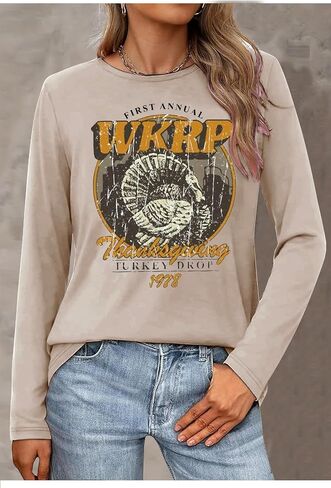 تي شيرت WKRP السنوي الأول لعيد الشكر تركيا قطرة راجلان تي شيرت نسائي عتيق برسومات تركية للبيسبول in Saudi Arabia
