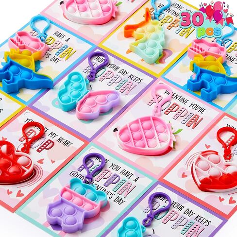 JOYIN 30 عبوة من بطاقات هدايا عيد الحب ذات 6 تصميمات مع سلاسل مفاتيح فقاعات البوب، بوب صغير ملون، ألعاب تململ متعددة الأشكال لتخفيف التوتر للأطفال هدايا حفلات عيد الحب وتبادل الهدايا في الفصل الدراسي in Saudi Arabia