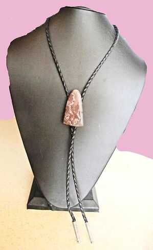 A Mauve and Gray Agate Is the Focus of this Bolo Tie With Black Leather Cord in Saudi Arabia
