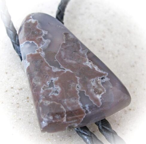 A Mauve and Gray Agate Is the Focus of this Bolo Tie With Black Leather Cord in Saudi Arabia
