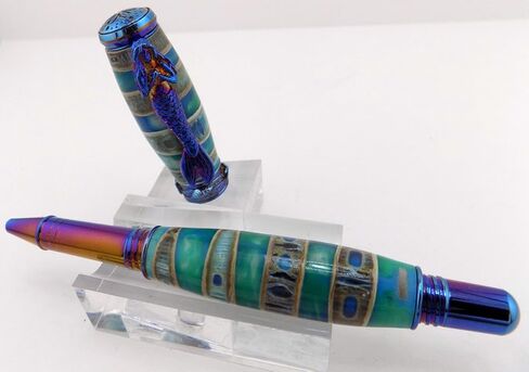Handmade Ocean Life style rollerball pen giftset in Rustic Wood treasure chest gift box. Shark vertebrae with blue/seafoam resin. Blue titanium trim. Postable cap. Mermaid pen clip/seashell band. in Saudi Arabia