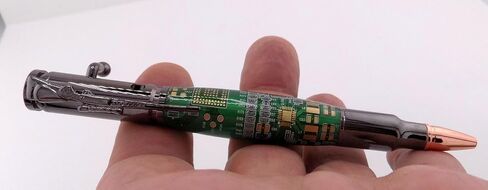 Handmade 30 Caliber Bolt Action Rifle themed ballpoint pen. Gunmetal Trim with Green circuit board body. in Saudi Arabia