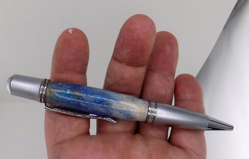 Handmade Sierra Mesa ballpoint pen. Blue and white icicle acrylic body. Trimmed in aluminum and chrome. Twist to open. Black ink. in Saudi Arabia