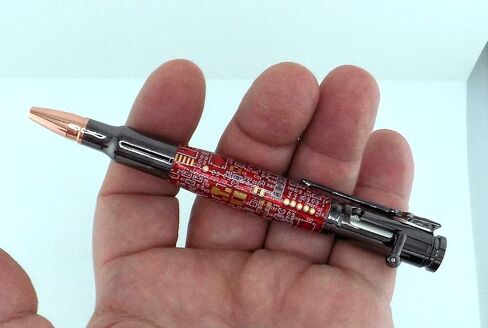 Handmade 30 Caliber Bolt Action Rifle ballpoint pen. Gunmetal Trim with Red circuit board body. in Saudi Arabia