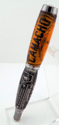 Handmade Artisan Jr Gentleman II style rollerball pen. Camacho cigar label collage in clear acrylic. Black titanium trim. Screw off postable cap. Black ink. in Saudi Arabia