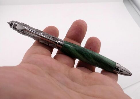 Handmade Survival ballpoint pen. Gunmetal trim. Green tamarind. Black ink. Emergency glass breaking tip feature. in Saudi Arabia