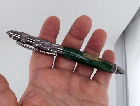 Handmade Survival ballpoint pen. Gunmetal trim. Green tamarind. Black ink. Emergency glass breaking tip feature. in Saudi Arabia