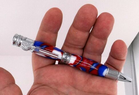 Handmade Patriotic themed ballpoint pen. Chrome trim. Red, white & blue acrylic. Twist to open. America on center band. USA on end cap. Eagle with flag pen clip. in Saudi Arabia