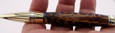 Handmade Professional style ballpoint pen. Stabilized pinecone in blue and yellow acrylic. Gold and chrome trim. Black ink. in Saudi Arabia