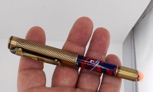 Handmade 45 Caliber themed ballpoint pen. Brass trim. Blue, red and white acrylic. Clicks to open. in Saudi Arabia