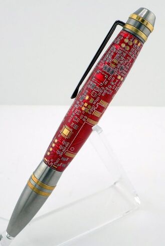 Handmade Professional style ballpoint pen. Red circuit board in clear acrylic. Stainless steel and brass trim. Black ink. in Saudi Arabia