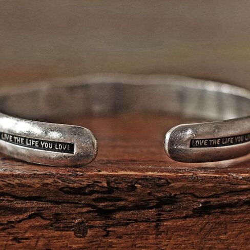 Steel punch imprinted memento mori silver cuff bracelet in Saudi Arabia