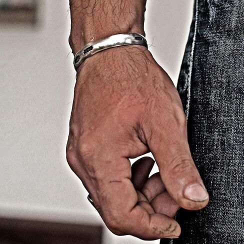 Steel punch imprinted memento mori silver cuff bracelet in Saudi Arabia