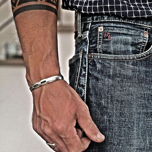 Steel punch imprinted memento mori silver cuff bracelet in Saudi Arabia
