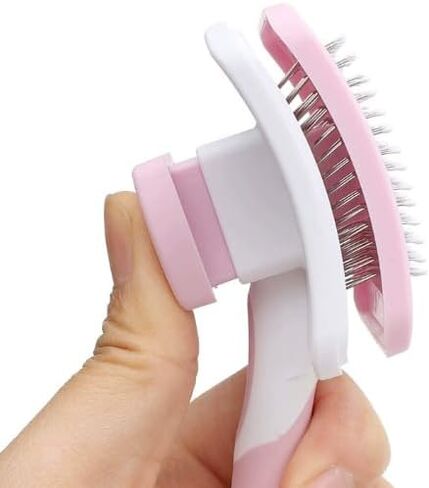 Self-cleaning sliding brush for dogs and cats, lightweight dog detangling brush for massaging and combing, cat brush gently removes undercoat in Saudi Arabia