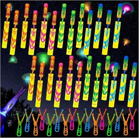 Ynybusi 50 Pcs Slingshot Outdoor Toys,Glow in The Dark Party Favor Toys Rocket with Launcher,LED Light Up Helicopter Toys,Glow Sticks Birthday Christmas Gifts Party Favors for Kids 4-8-12 Bulk Toys in Saudi Arabia