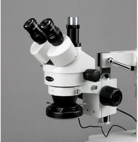 AmScope SM-4T Professional Trinocular Stereo Zoom Microscope, WH10x Eyepieces, 7X-45X Magnification, 0.7X-4.5X Zoom Objective, Ambient Lighting, Double-Arm Boom Stand in Saudi Arabia