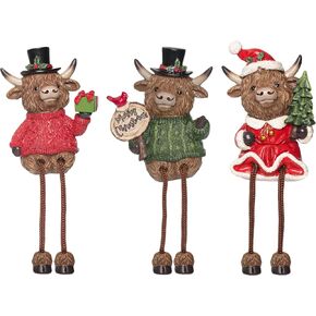 Christmas Highland Cow Figurines Decor, 6.5Inch 2PCS Cows by Snow-Dusted Christmas Trees with Star/Gift/Ball/Candy Cane, Xmas Resin Ornament Statue for Garden Kitchen Home Table Decoration in Saudi Arabia