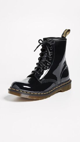 Dr. Martens, 1490 10-Eye Leather Boot for Men and Women, Black Smooth, 7 US Women/6 US Men in Saudi Arabia