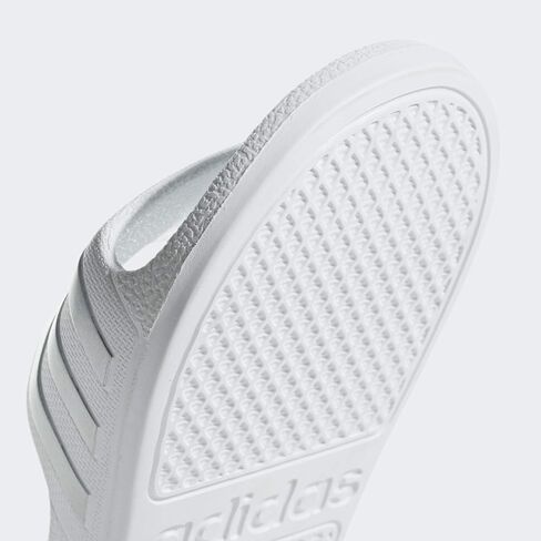 adidas Women's Adilette Comfort Slide Sandal, Black/Off White/Magic Beige, 6 in Saudi Arabia