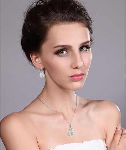 مجموعة مجوهرات من الفضة الإسترلينية عيار 925 من Gem Stone King مكونة من قلادة وأقراط من الياقوت الأزرق للنساء (18.39 قيراط، بيضاوية 12 × 10 مم، مع سلسلة 18 بوصة) in Kuwait