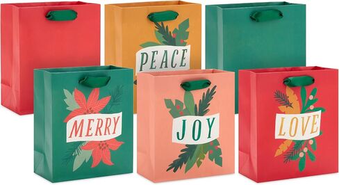 مجموعة حقائب هدايا عيد الميلاد الصغيرة مقاس 6 بوصات من Hallmark (6 أكياس: Modern Merry، Joy، Love، Peace) أخضر، أحمر، أصفر، وردي in Saudi Arabia