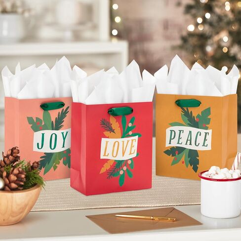 مجموعة حقائب هدايا عيد الميلاد الصغيرة مقاس 6 بوصات من Hallmark (6 أكياس: Modern Merry، Joy، Love، Peace) أخضر، أحمر، أصفر، وردي in Saudi Arabia
