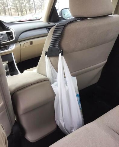 Auto | The Only Side of The Seat Headrest Hook Designed for The Drivers Reach and Safety, Centrally Located for Bags in Saudi Arabia
