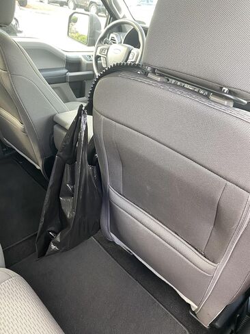 Auto | The Only Side of The Seat Headrest Hook Designed for The Drivers Reach and Safety, Centrally Located for Bags in Saudi Arabia