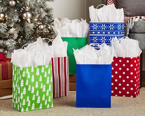 Hallmark 9" Medium Holiday Gift Bag Assortment (Pack of 12, Solids and Prints in Red, Green, Blue) Paper Gift Bags with Christmas Trees, Stripes, Polka Dots, Ho Ho Ho and More in Saudi Arabia