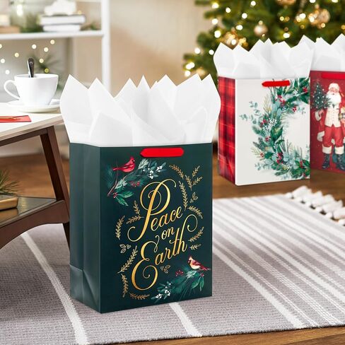 مجموعة حقيبة هدايا عيد الميلاد الكبيرة مقاس 13 بوصة من Hallmark (3 أكياس: سانتا العتيق، إكليل الزهور، السلام على الأرض مع الكاردينالز) أخضر غابة، عنابي، كريمي in Kuwait