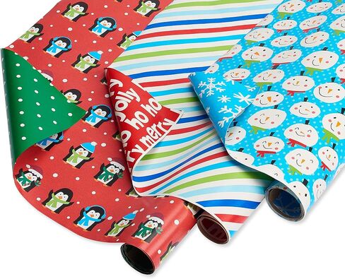 American Greetings Jumbo Kids Christmas Wrapping Paper Roll, Dinosaur, Unicorns, and Yetis Holiday Gift Wrap (175 sq. ft., 1 Extra Large Reversible Roll-30 in. x 70 ft.) Colorful, Black, Green in Saudi Arabia