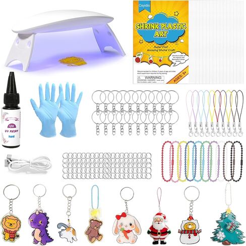 Csyidio 160PCS Shrink Plastic Sheet Kit with 15PCS Shrink Papers, UV Resin, UV Lamp and Keychains Accessories for Kids Craft Ornaments, DIY Key Chains & Christmas Decor in Kuwait