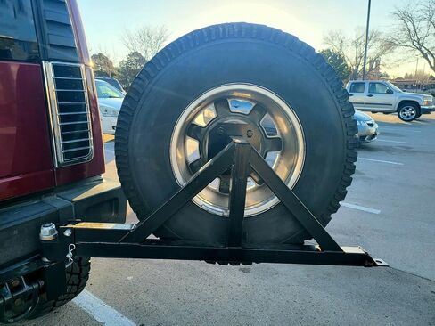 KUAFU Spare Tire Carrier Mount Compatible with Hummer H2 with Rear License Plate Relocating Kit w/Light Black in Saudi Arabia