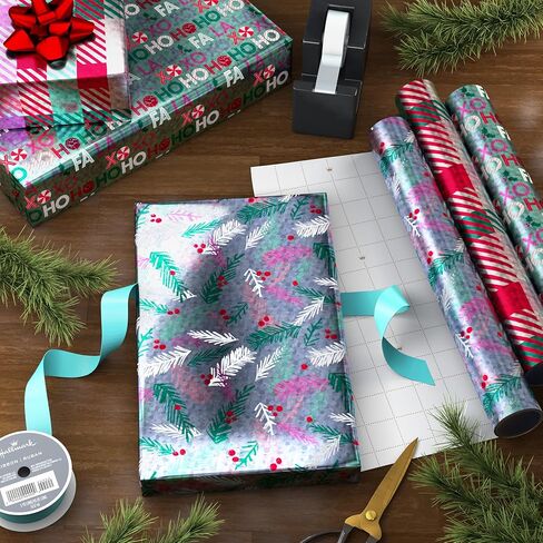 Hallmark Mint Green, Pink and Purple Christmas Wrapping Paper Mini Rolls, 3-Pack (Plaid, Evergreen Sprigs, Fa La La Ho Ho Ho XOXO) for Kids, Teens, Winter Birthdays - 45 Sq. Ft. Total in Saudi Arabia