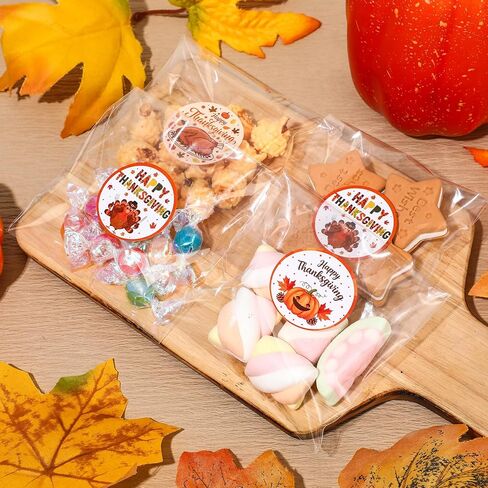Eaasty 200 Pack Self Adhesive Christmas Cellophane Treat Bags with Stickers, Plastic Christmas Gift Cookie Bags Bulk for Gift Giving Candy Snack Wrapping Supplies in Saudi Arabia
