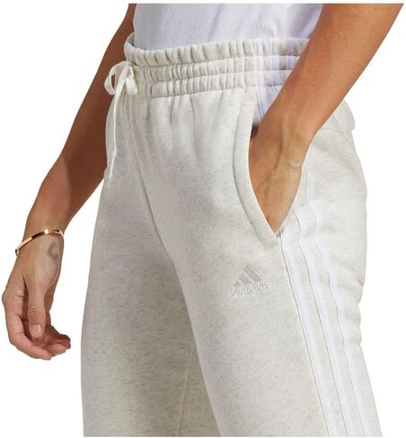 adidas Women's Plus Size Essentials Fleece Tapered Cuff Pants in Saudi Arabia