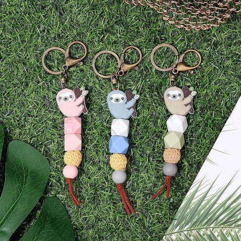 Tondiamo 3 Pcs Christmas Sloth Gifts Sloth Keychain for Women Girl Silicone Bead Cute Animal Sloth Car Accessories Tassel Sloth Key Chain Bag Charm for Purse, Handbags, Backpack, Car Keys, 3 Colors in Saudi Arabia