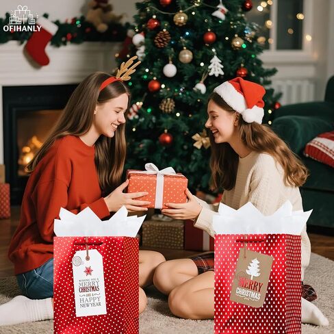 OFIHANLY 2 Pack 12.6" Medium Size Merry Christmas Gift Bags with Handles for Xmas Holiday Presents Red Paper Wrapping Bag with Tissue Paper in Saudi Arabia