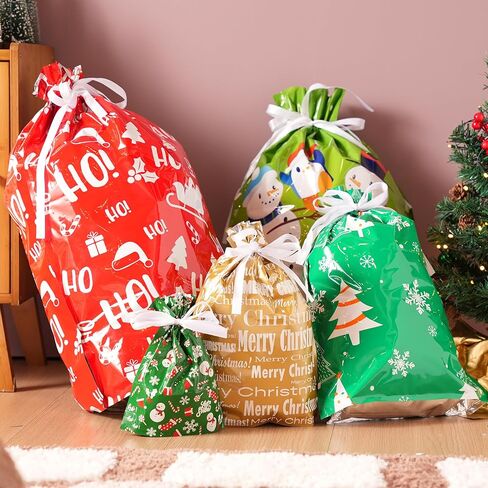JOYIN 24 Pcs Christmas Drawstrings Foil Gift Bags, Xmas Wrapping Gift Assorted Styles Bag with present Tag for Christmas Holiday Party Favor, Reusable Wrap Goodie Bag Decorations in Saudi Arabia