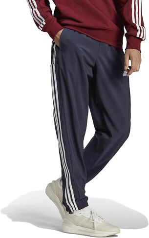adidas Men's Aeroready Essentials Woven 3-Stripes Tapered Pants in Saudi Arabia