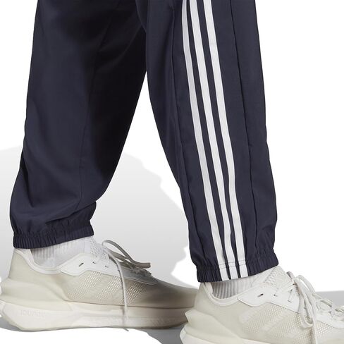 adidas Men's Aeroready Essentials Woven 3-Stripes Tapered Pants in Saudi Arabia