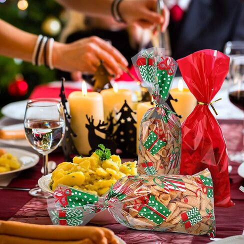 Outus 105 Pieces Christmas Cellophane Bags with 200 Pieces Twist Ties 7 Styles Christmas Treat Cookie Candy Bags for Xmas Holidays Party Favor Supplies in Saudi Arabia